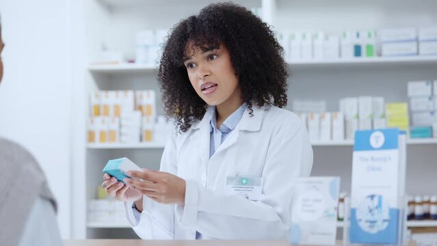 Medical pharmacist and drug store professional gives advice to client. Pharmacy and service for patients with care and friendly management. Health shop worker explaining how to use medicine