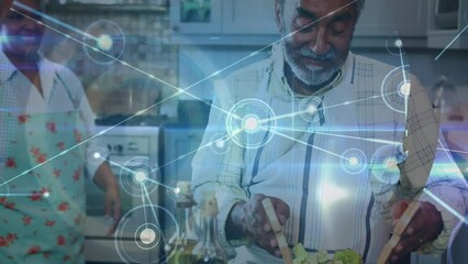 Animation of network of connections over senior african american couple cooking in kitchen - Powered by Adobe
