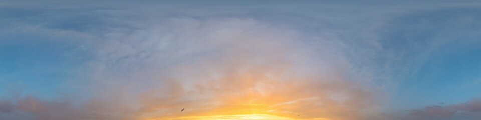 Bright sunset sky panorama with Cirrus clouds. Hdr seamless spherical equirectangular 360 panorama. Sky dome or zenith for 3D visualization, game and sky replacement for aerial drone 360 panoramas.