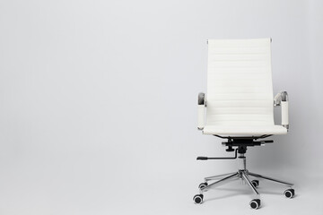 Comfortable office chair on white background, space for text