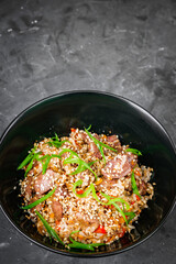 traditional chinese fried rice on black background
