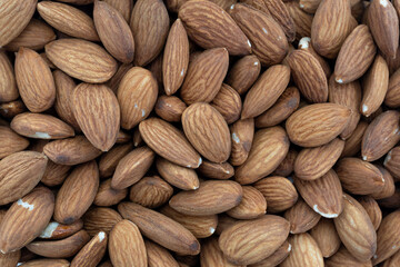 Fototapeta premium Overhead view of a group of almond nuts.