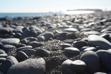 Pebbles on Reynisfjara Black Beach in Iceland