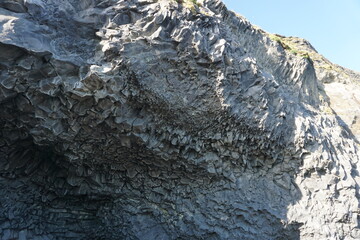 Basalt rocks at Reynisfjara Black Beach in Iceland - close-up