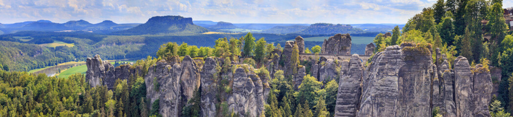 Beautiful landscape, panorama, banner - view of the Bastei rock formations and the Bastei Bridge in...
