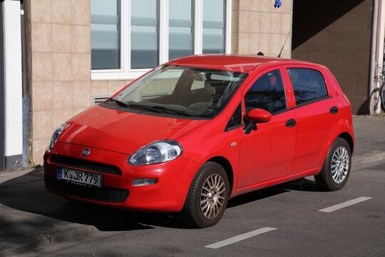 COLOGNE, GERMANY - SEPTEMBER 22, 2020: Fiat Grande Punto hatchback city car parked in Germany. There were 45.8 million cars registered in Germany (as of 2017).