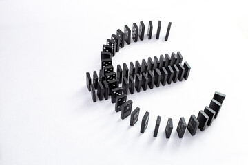 Domino pieces forming euro currency symbol, side view isolated on white,