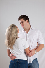 Romantic couple smiling together with joy