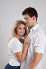 Fototapeta premium Romantic couple smiling together with joy