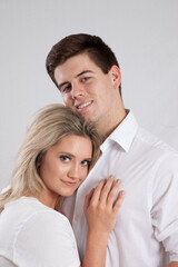 Romantic couple smiling together with joy