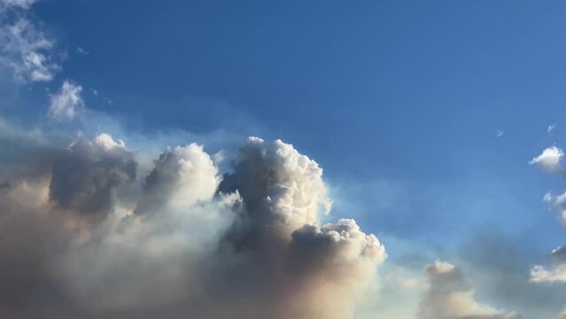 Time lapse fast moving white clouds moving in sky