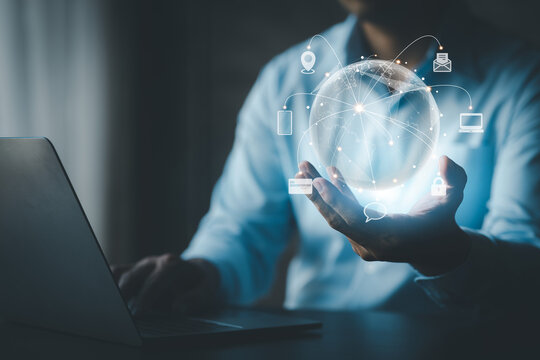 Businessmen with hologram icon online data network connection, upload data to cloud so that the data can be transferred to other devices and can be viewed online any time. Network connection concept.