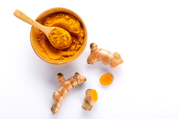 Turmeric powder and turmeric root isolated on white background ,Top view