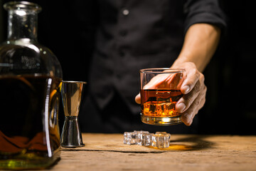 Bartender Serve Whiskey, on wood bar, 