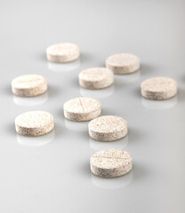 effervescent pill for disolving in a glass of water