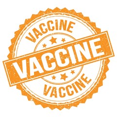 VACCINE text on orange round stamp sign