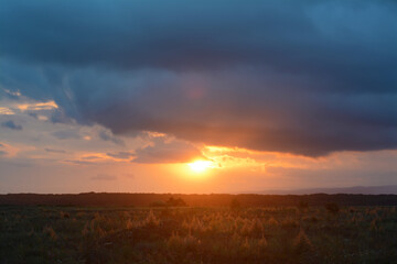 Picturesque view of beautiful countryside at sunset