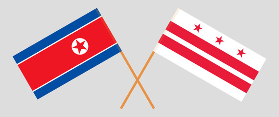 Crossed flags of North Korea and District of Columbia. Official colors. Correct proportion