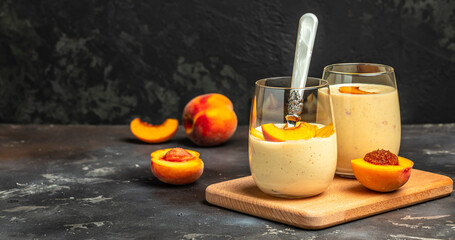 Yoghurt with fresh peaches, Delicious breakfast or snack, Clean eating, dieting food concept, Long banner format
