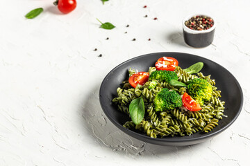 Vegetable penne pasta with spinach. proper diet. Clean eating, dieting, vegan food concept. top view