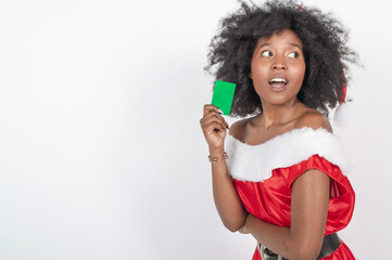 shocked black woman in a christmas costume with a green card, facial gesture