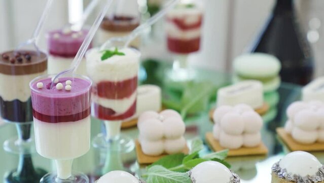 Variety of delicious desserts, cakes with cream, chocolate , whipped creaC