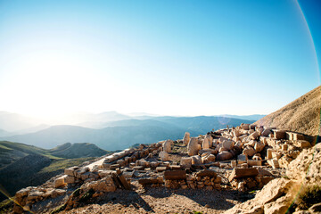 Heads of the statues on Nemrut Dag on the sunset.