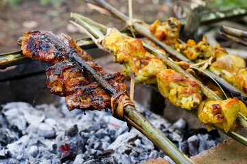 Indonesian traditional grilled chicken. grilled chicken that is grilled in the traditional Indonesian way.