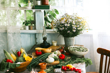 table on veranda of country village house with different vegetables, eco-friendly food from garden, autumn harvesting