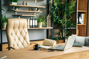 Modern office of general manager, businessman, ceo. Stylish wooden table, leather chair, interior. Workplace, workspace of accountant, financial director. Shelves with documents. Home library - Powered by Adobe