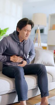 man has stomachache