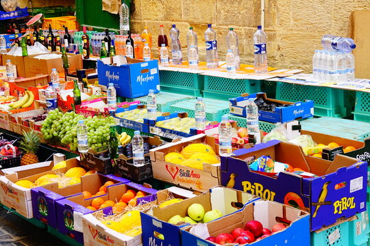 Street Market Of Vegetables, Fruits And Water In Valletta, Malta Island