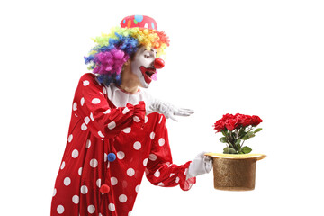 Clown performing a magic trick with a hat and red roses