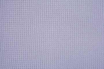 background of soft blue cotton fabric in a small cell