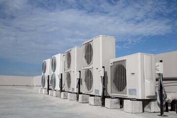 Air conditioning (HVAC) installed on the roof of industrial buildings.