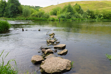 Stones in the water of a river stream