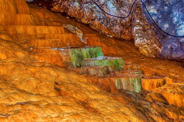 Beautiful internal water made cascades inside Stopica cave at Zlatibor, Serbia.