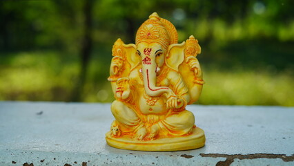 Close up of beautiful Ganesha idol. Ganesh Chaturthi is a Hindu festival celebrating the arrival of...