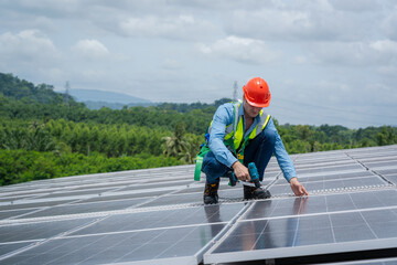 Technician checks and maintenance of the solar panel at solar power plant,Solar panels.