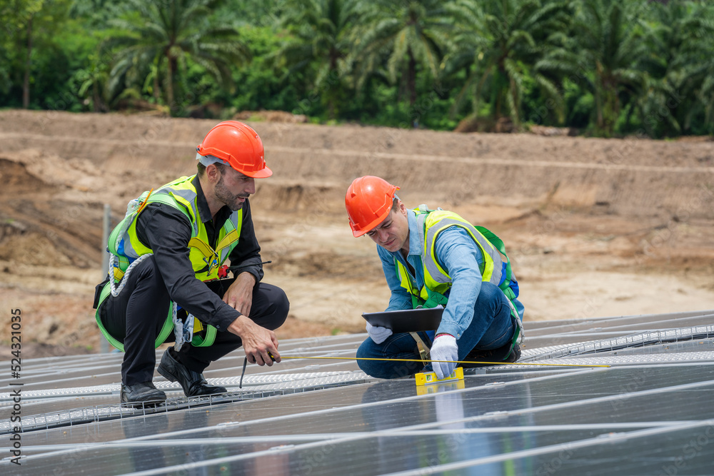 Poster installing solar cell on a roof,engineer working at solar power station.