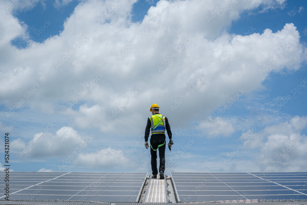 Poster technicians are checking solar panel,engineer service check installation solar cell on the roof of f