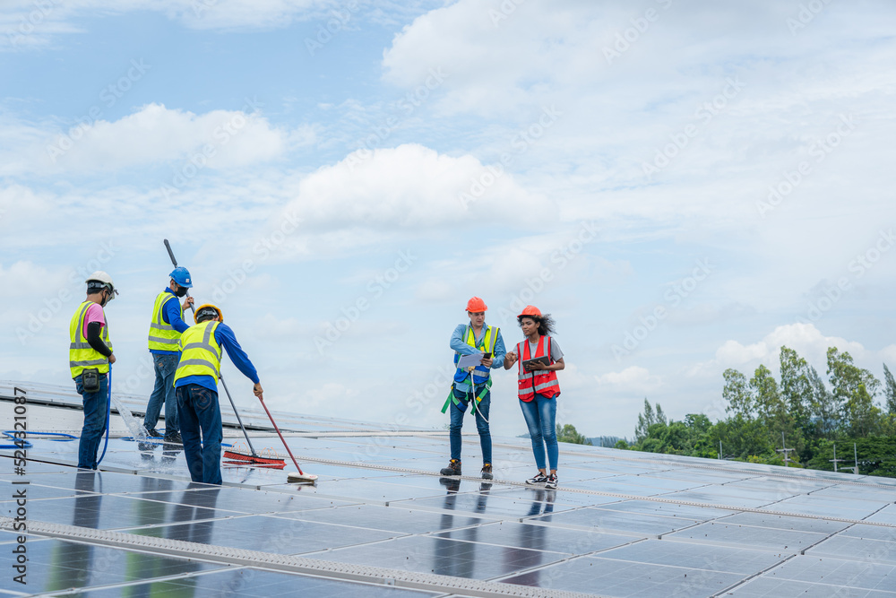 Aufkleber clean solar panel for good performance in service routine of operation plan in solar power plant.