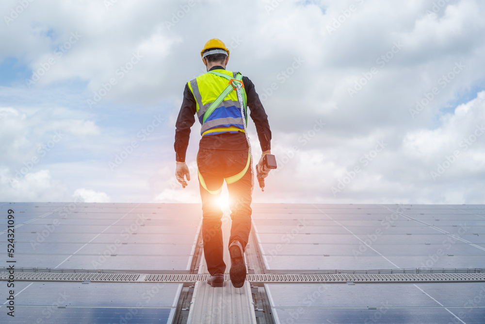 Poster installing solar cell on a roof,engineer working at solar power station.