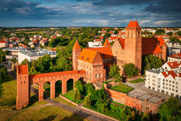 The castle and cathedral in Kwidzyn illuminated by the setting sun, Poland