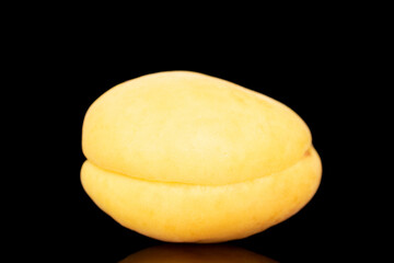 One bright yellow juicy apricot, macro, isolated on a white background.