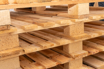 A stack of wooden pallets, a wooden structure made of improvised materials.