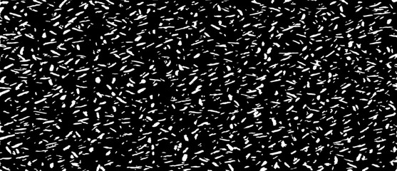 Small uneven spots and particles of debris. Abstract vector texture. Distressed uneven background. Grunge texture overlay with fine grains isolated on white background. Vector illustration. EPS10.