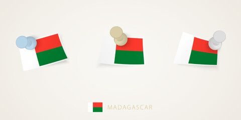 Pinned flag of Madagascar in different shapes with twisted corners. Vector pushpins top view.