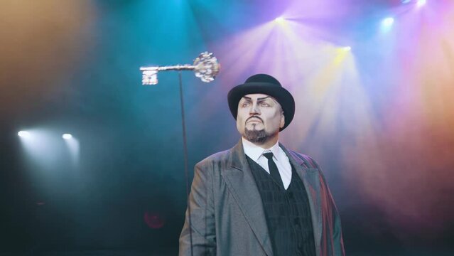 Performance artist. The character of the opera Herman from "The Queen of Spades" stands on the stage.