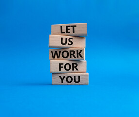 Let us work for you symbol. Wooden blocks with words Let us work for you. Beautiful blue background. Business and Let us work for you concept. Copy space.